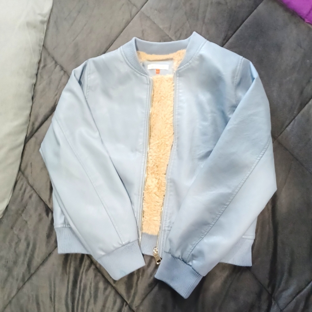 This Is a jacket made out of lether the inside really soft it is a size large